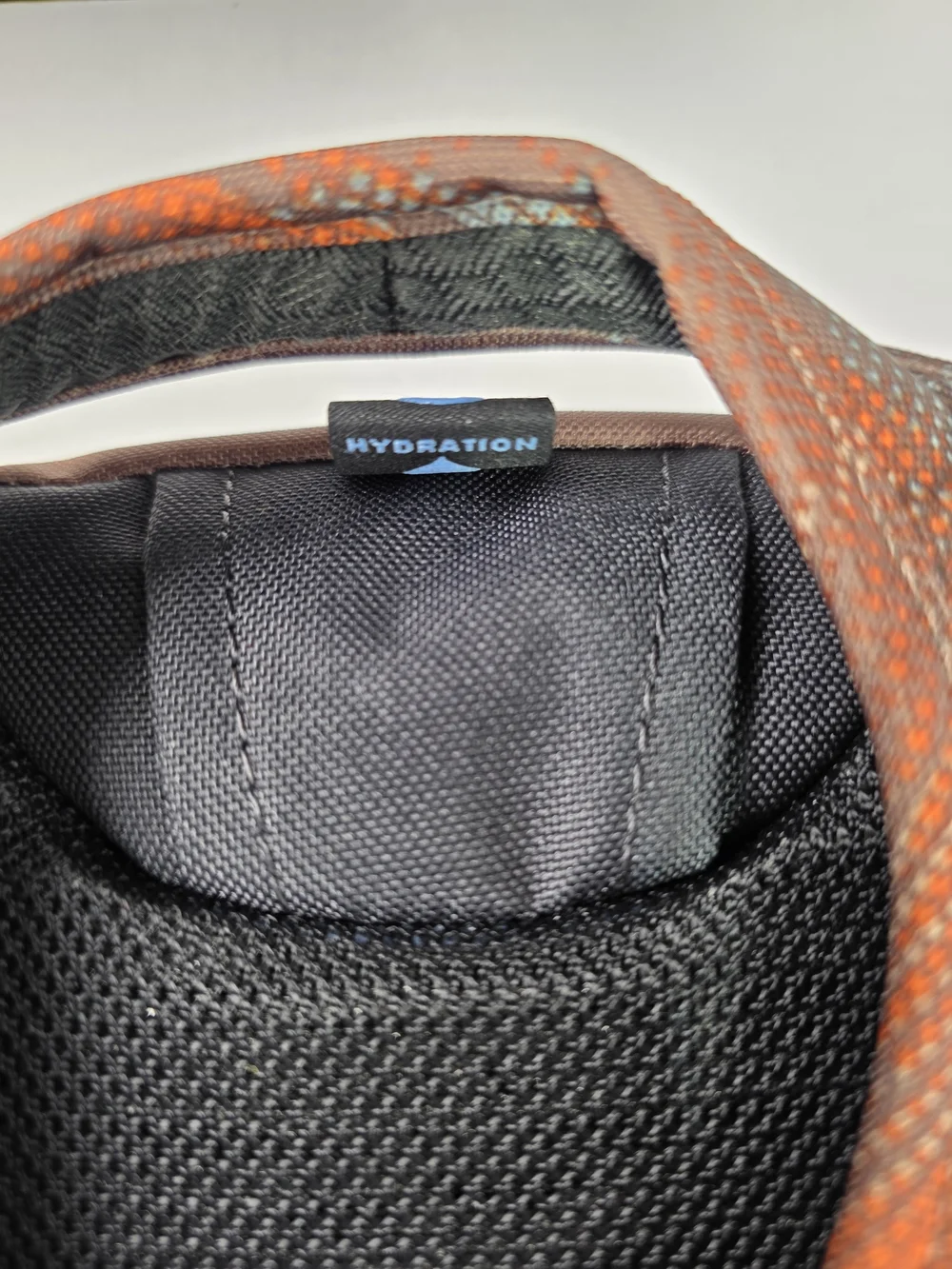 OSPREY Smoky Desert Print Daylite Backpack in Brown with Orange and Blue Accents
